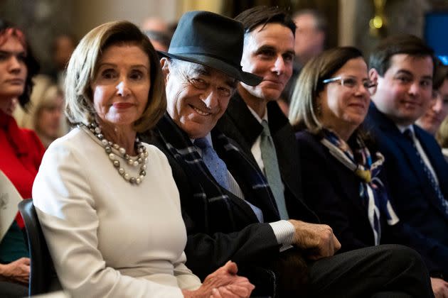 Rep. Nancy Pelosi and her husband, Paul Pelosi, attend a portrait unveiling ceremony in the U.S. Capitol's Statuary Hall on Dec. 14 in Washington.