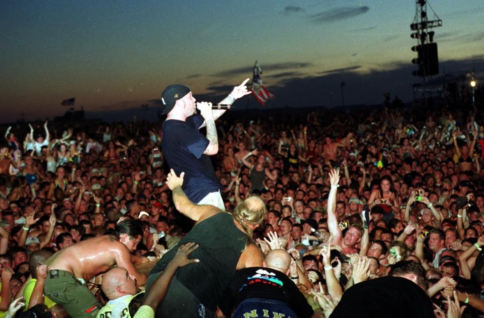 more people fighting to get on stage with Limp Bizkit