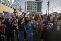 Protesters gather in Sulaimaniyah on Sept. 28, 2022, protest the killing of Mahsa Amini, an Iranian Kurdish woman after she was arrested in Tehran by morality police for wearing her headscarf improperly. Iran has accused Kurdish opposition groups in exile of orchestrating the wave of protests across the country over the past two weeks. But Kurdish activists say the government is just trying to scapegoat them to distract from the domestic anger fueling the unrest. (AP Photo/Hawre Khalid, Metrography)