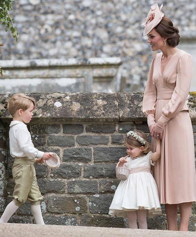 A few hours later, Kate was seen in full wedding day gear with her children George and Charlotte. Photo: Getty