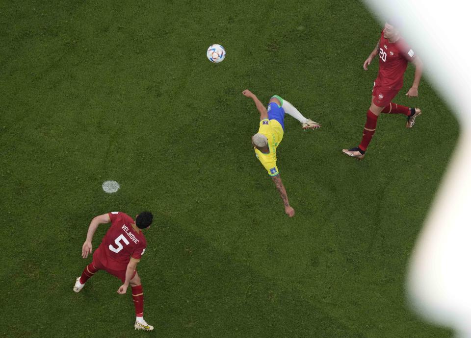 Brazil's Richarlison scores his second goal during the World Cup group G soccer match between Brazil and Serbia, at the Lusail Stadium in Lusail, Qatar, Thursday, Nov. 24, 2022. (AP Photo/Thanassis Stavrakis)