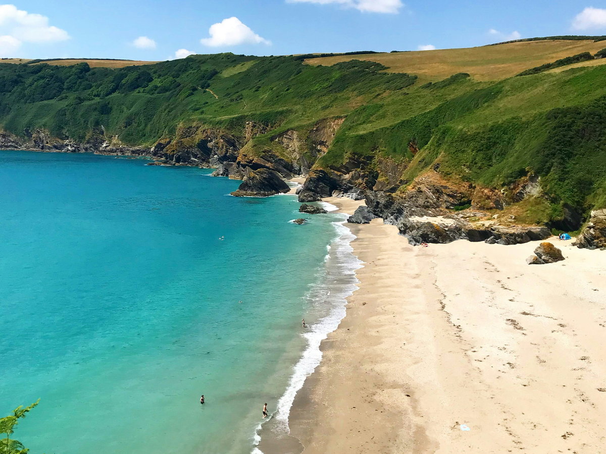 Discover hidden coastal spots, such as secluded Lantic Bay, Cornwall  (Unsplash / James Shaw)