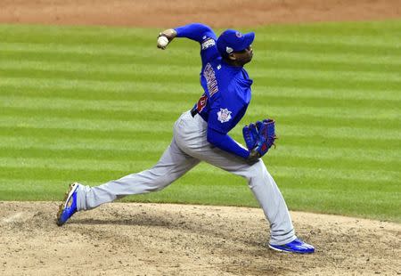 Oct 26, 2016; Cleveland, OH, USA; Chicago Cubs relief pitcher Aroldis Chapman throws against the Cleveland Indians in the 9th inning in game two of the 2016 World Series at Progressive Field. Tommy Gilligan-USA TODAY Sports
