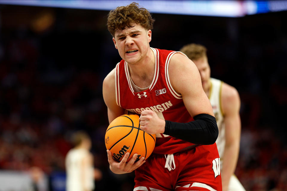 MINNEAPOLIS, MINNESOTA - MARCH 16: Max Klesmit #11 of the Wisconsin Badgers celebrates against the Purdue Boilermakers in the first half of the Semifinals of the Big Ten Tournament at Target Center on March 16, 2024 in Minneapolis, Minnesota. (Photo by David Berding/Getty Images)