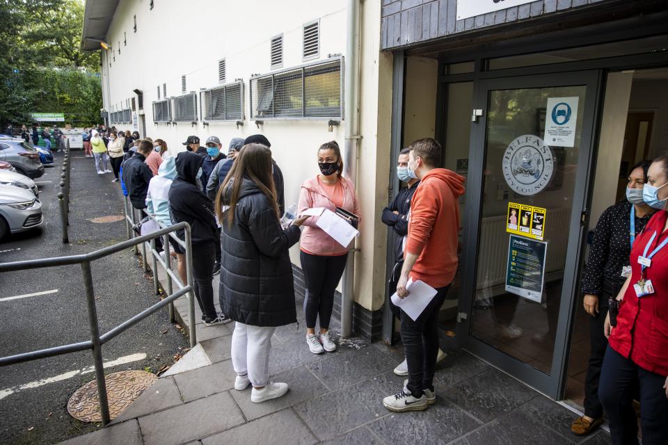 Festival goers at Feile an Phobail queuing to receive the coronavirus vaccination for an event ticket. (Liam McBurney/PA) (PA Wire)