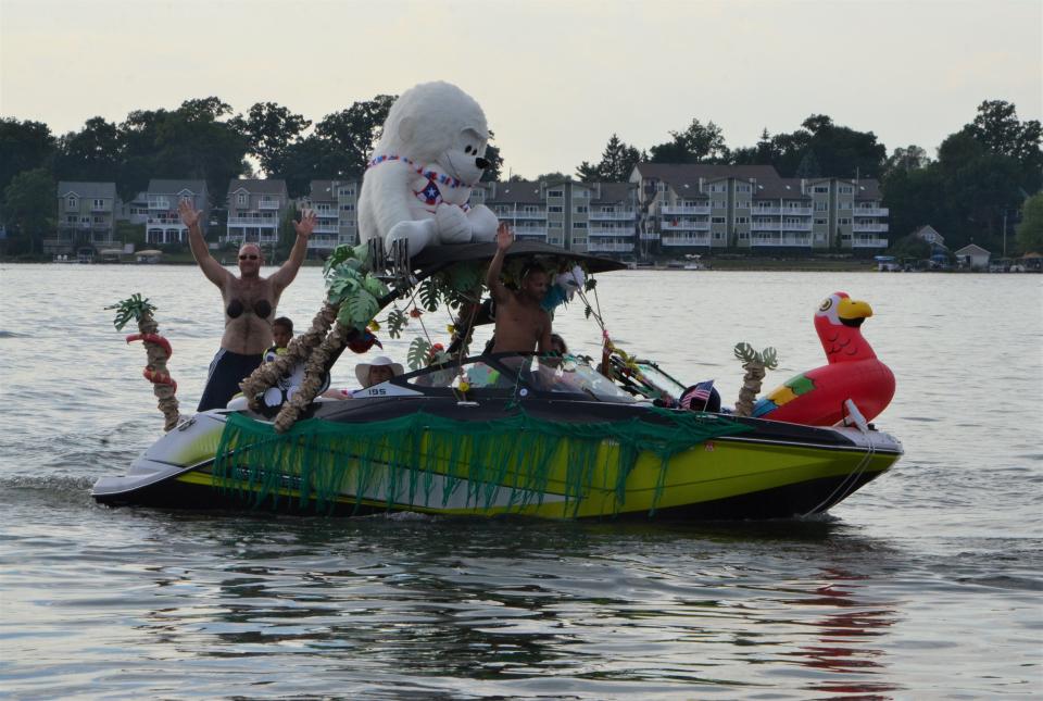 A jungle-themed boat in the Goguac Lake Boat Parade on Thursday, July 4, 2019. The boat shared the award for "most creative."