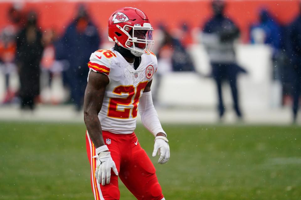 Kansas City Chiefs running back Le'Veon Bell readies during the second half against the Denver Broncos on Sunday.