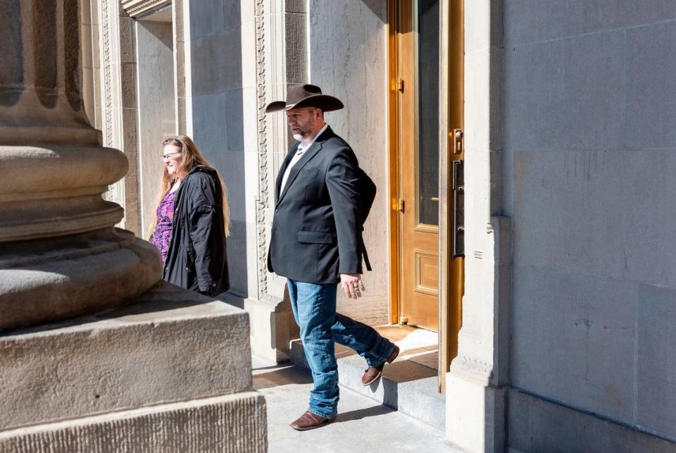 Ammon Bundy leaves the Idaho Capitol after filing over 1,000 signatures to run as an independent candidate for governor in 2022.