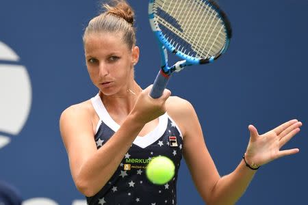 Sep 2, 2018; New York, NY, USA; Karolina Pliskova of Czech Republic hits to Ashleigh Barty of Australia (not pictured) in a fourth round match on day seven of the 2018 U.S. Open tennis tournament at USTA Billie Jean King National Tennis Center. Mandatory Credit: Danielle Parhizkaran-USA TODAY SPORTS