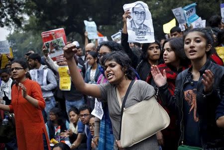 Demonstrators shout slogans as they hold placards during a protest demanding the release of Kanhaiya Kumar, a Jawaharlal Nehru University (JNU) student union leader accused of sedition, in New Delhi, India, February 18, 2016. REUTERS/Anindito Mukherjee