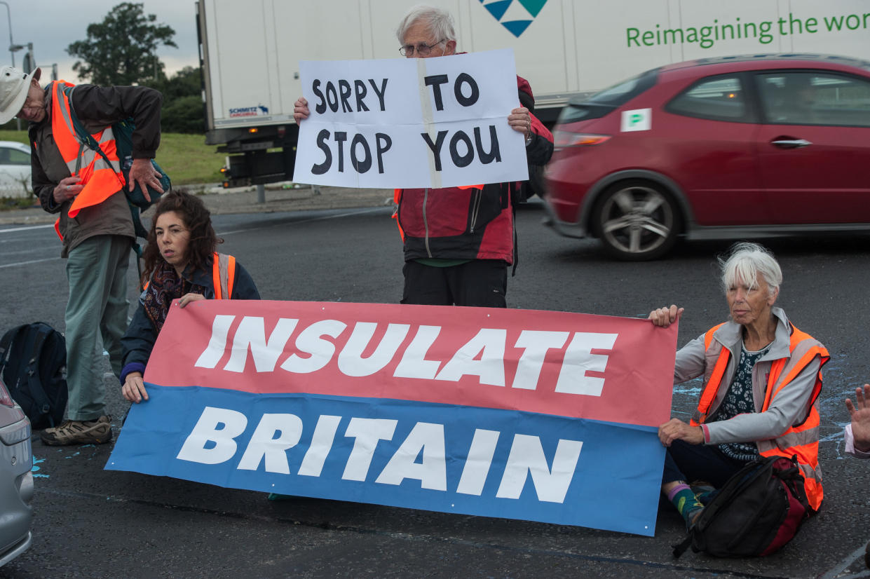 HATFIELD, HERTFORDSHIRE - SEPTEMBER 20: The traffic is brought to a standstill as protestors from Insulate Britain block a major roundabout near the A1(M) on September 20, 2021 in Hatfield, England. (Photo by Guy Smallman/Getty Images)