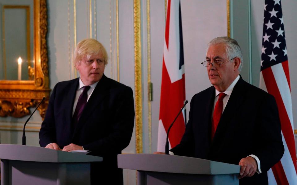 Boris Johnson (L) and US Secretary of State Rex Tillerson attend a joint press conference  - Credit: ADRIAN DENNIS /AFP