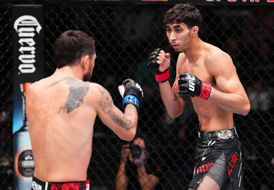 LAS VEGAS, NEVADA – MARCH 23: (R-L) Fernando Padilla of Mexico battles Luis Pajuelo of Peru in a featherweight fight during the UFC Fight Night event at UFC APEX on March 23, 2024 in Las Vegas, Nevada. (Photo by Chris Unger/Zuffa LLC via Getty Images)