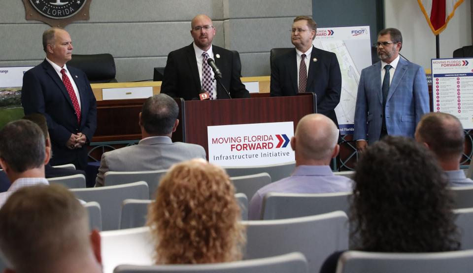 Florida Department of Transportation Secretary Jared Perdue addresses a gathering at Ormond Beach City Hall on Tuesday morning, Sept. 26, 2023, to announce the awarding of $340 million from the state for the design and construction of a new Interstate 95/US1 interchange in Ormond Beach. Construction is expected to begin in fall 2027. Also pictured: Ormond Beach Mayor Bill Partington, left, John Tyler, FDOT District 5 Secretary for Central Florida, and State Rep. Tom Leek (R-Ormond Beach, chair of the Florida House Appropriations Committee.