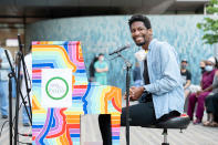 <p>Jon Batiste performs on a Sing for Hope piano outside of NYU Langone Hospital in New York City during a Black Lives Matter rally on Saturday.</p>