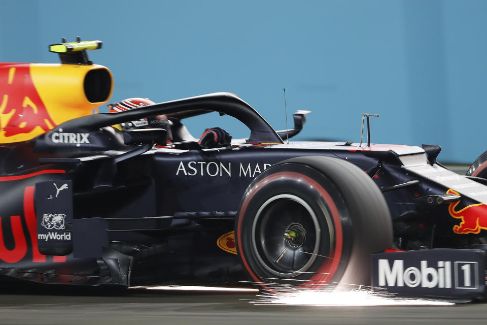 Red Bull driver Alexander Albon of Thailand steers his car during the qualifying round for the Singapore Formula One Grand Prix at the Marina Bay City Circuit in Singapore, Saturday, Sept. 21, 2019. (AP Photo/Vincent Thian)