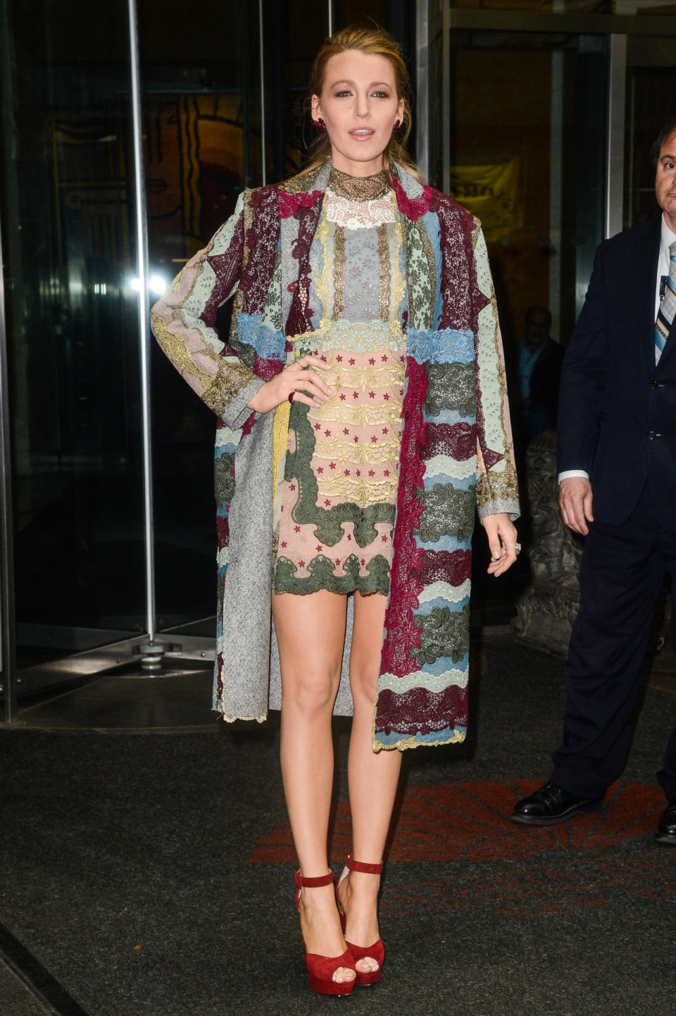 Outside of her hotel, en route to continue promoting “Age of Adaline,” Lively wore a Valentino dress with matching coat from the brand’s most recent collection.