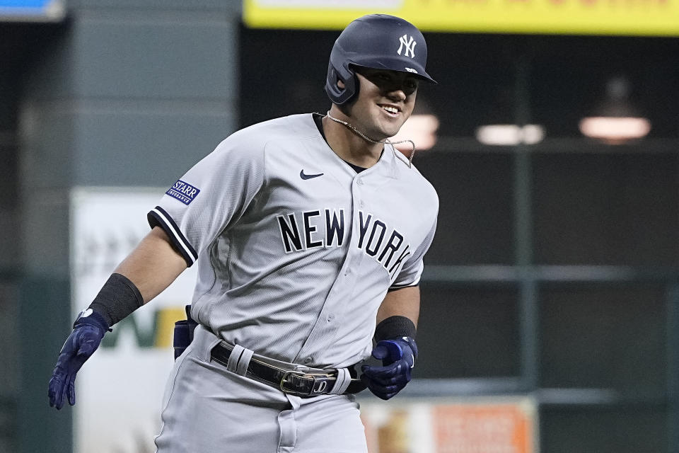 New York Yankees' Jasson Dominguez runs the bases after hitting a two-run home run against the Houston Astros in his first at-bat in the majors, in the first inning of a baseball game Friday, Sept. 1, 2023, in Houston. (AP Photo/Kevin M. Cox)