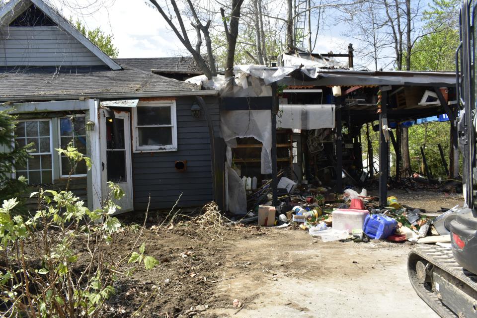 The Town of Ellettsville won a lawsuit against Robert Lowers over property violations. This week, town workers are clearing disallowed structures and debris at his home on Main Street/Ind. 46.