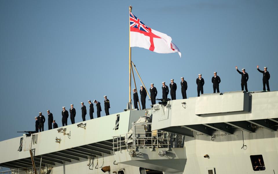 Naval personnel perform Procedure Alpha as they arrive in Portsmouth