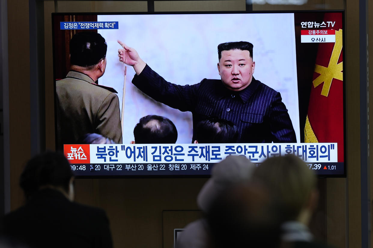 A TV screen shows an image of North Korean leader Kim Jong Un, during a news program at the Seoul Railway Station in Seoul, South Korea, Tuesday, April 11, 2023. Kim vowed to enhance his nuclear arsenal in more "practical and offensive" ways as he met with senior military officials to discuss the country's war preparations in the face of his rivals' "frantic" military exercises, state media said Tuesday. The letters read "North Korea, Kim Jong Un presides the meeting of the Central Military Commission yesterday." (AP Photo/Lee Jin-man)