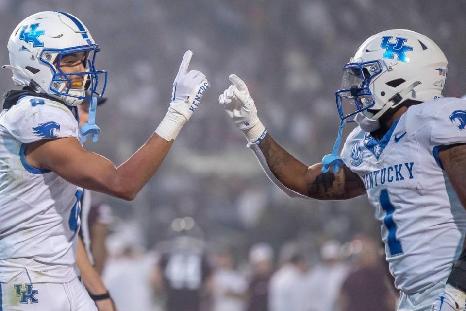 Kentucky wide receiver Dane Key, left, and running back Ray Davis (1) celebrate after Key scored a touchdown against Mississippi State.