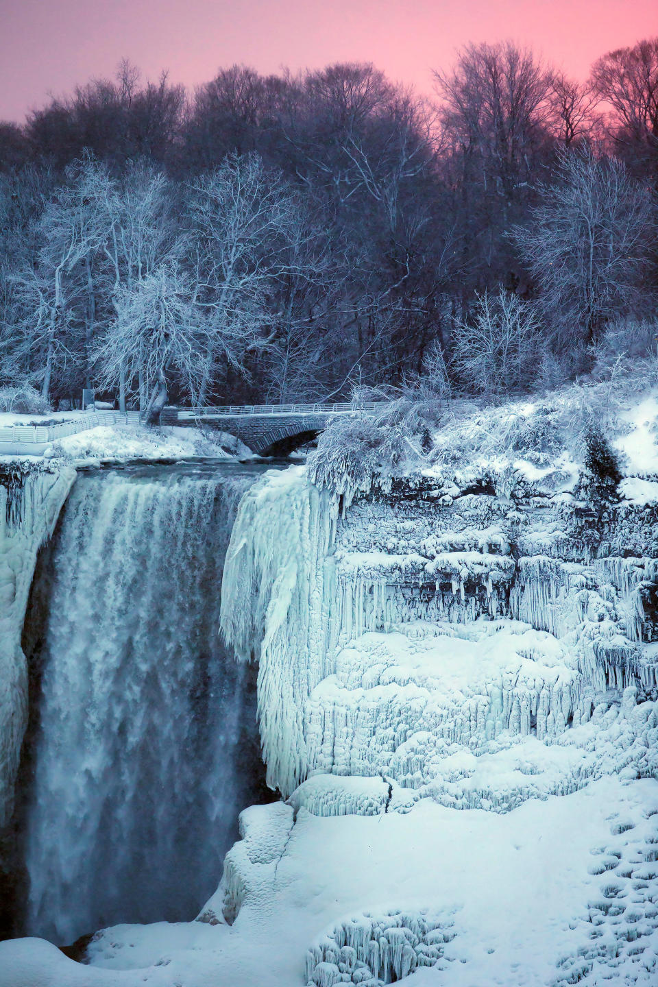 Ice and water flow over the American Falls, viewed from the Canadian side in Niagara Falls, Ontario, Canada, Jan. 3, 2018.