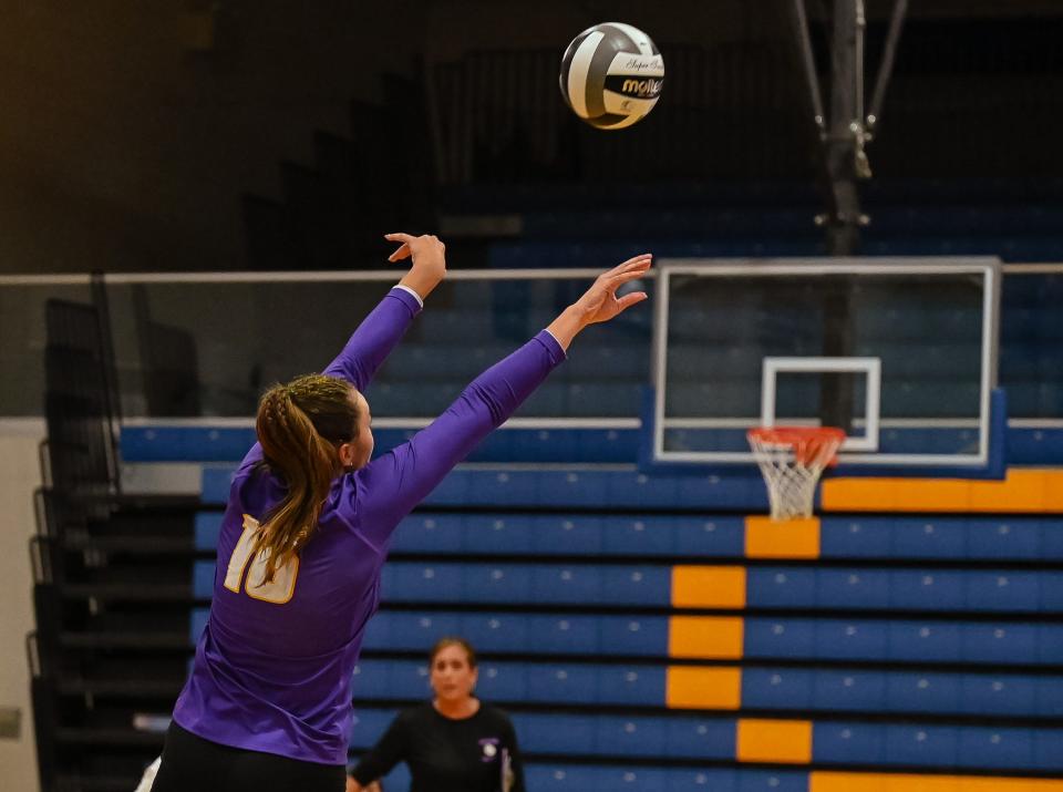 Lexington's Bella Temple sends a set toward the net during Lady Lex's win over Ontario in the first game of the year.