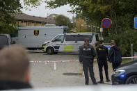 Police officers are seen as Peter Madsen is surrounded by the police in Albertslund