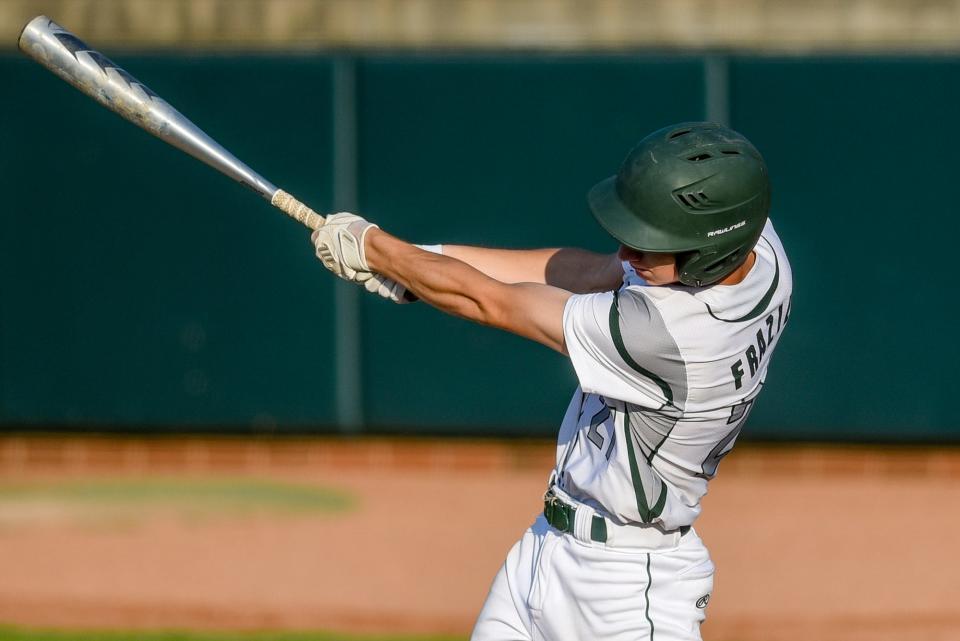 Olivet's Cam Frazier drives in a run against Okemos during the ninth inning on Wednesday, May 31, 2023, at McLane Stadium on the Michigan State campus in East Lansing.