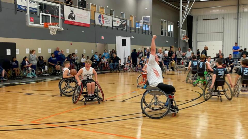 The Roger C. Peace Rollin' Tigers celebrate winning the NWBA Prep Division National Championship, March 26, 2023