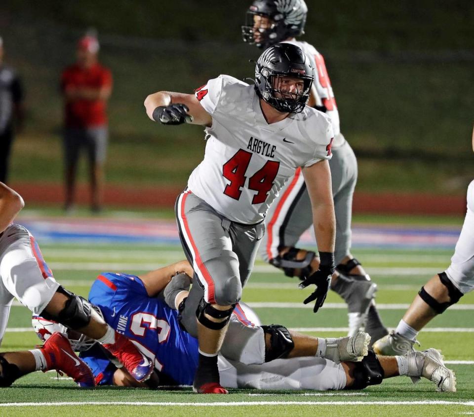 Argyle defensive lineman Riley Van Poppel (44) heads into the backfield in the second half of a high school football game at Mustang-Panther Stadium in Colleyville, Texas, Friday, Sept. 09, 2022. Argyle defeated Grapevine 31-15. (Special to the Star-Telegram Bob Booth)