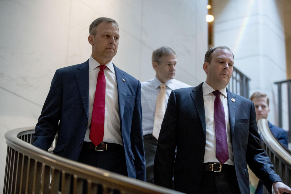 Republican lawmakers, from left, Rep. Scott Perry, R-Pa., Rep. Jim Jordan, R-Ohio, ranking member of the Committee on Oversight Reform, and Rep. Lee Zeldin R-N.Y., arrive for a closed door meeting on Capitol Hill in Washington, Monday, Oct. 14, 2019, where former White House advisor on Russia, Fiona Hill, is scheduled to testify before congressional lawmakers as part of the House impeachment inquiry into President Donald Trump. (AP Photo/Andrew Harnik)