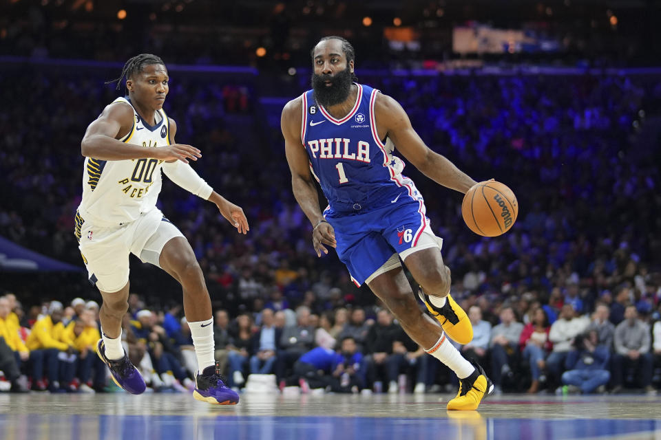 PHILADELPHIA, PA - JANUARY 04: James Harden #1 of the Philadelphia 76ers drives to the basket against Bennedict Mathurin #00 of the Indiana Pacers in the second quarter at the Wells Fargo Center on January 4, 2023 in Philadelphia, Pennsylvania. NOTE TO USER: User expressly acknowledges and agrees that, by downloading and or using this photograph, User is consenting to the terms and conditions of the Getty Images License Agreement. (Photo by Mitchell Leff/Getty Images)