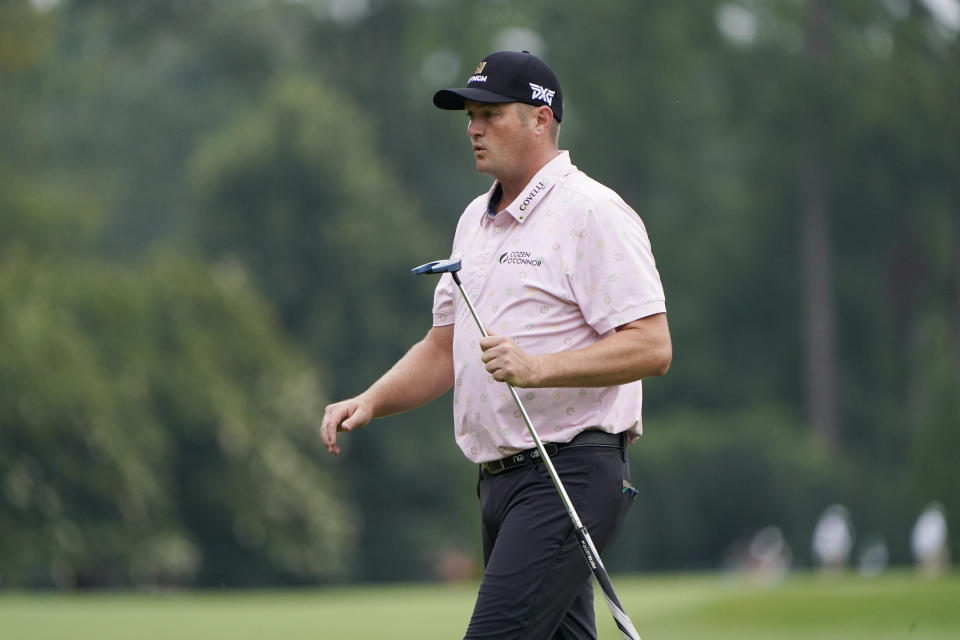 Jason Kokrak walks across the first green during the third round of the Wyndham Championship golf tournament at Sedgefield Country Club on Saturday, Aug. 15, 2020, in Greensboro, N.C. (AP Photo/Chris Carlson)