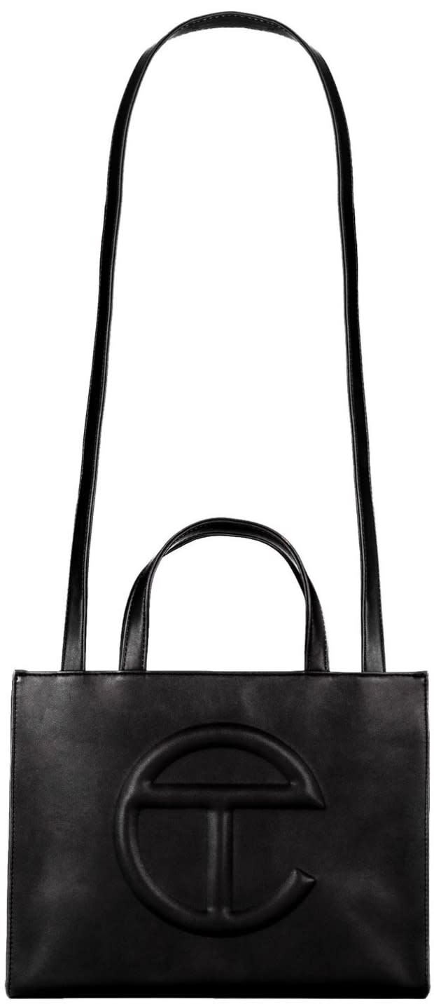 Telfar Medium Black Shopping Bag, $190, <a href="https://shop.telfar.net/collections/accessories/products/medium-white-shopping-bag" rel="nofollow noopener" target="_blank" data-ylk="slk:available here;elm:context_link;itc:0;sec:content-canvas" class="link ">available here</a>.