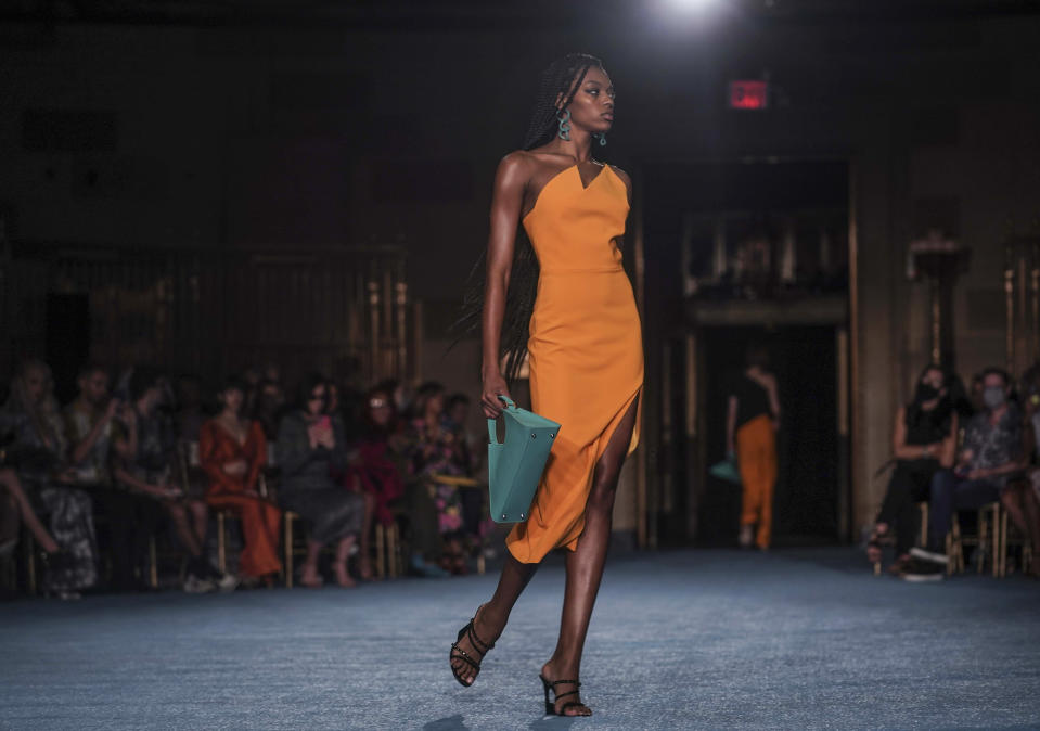 The latest fashion from Christian Siriano is modeled during New York's Fashion Week, Tuesday, Sept. 7, 2021. (AP Photo/Bebeto Matthews)