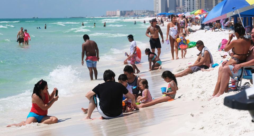 People enjoy the sun and water at June Decker White Park in Destin as the Labor weekend comes to a close.