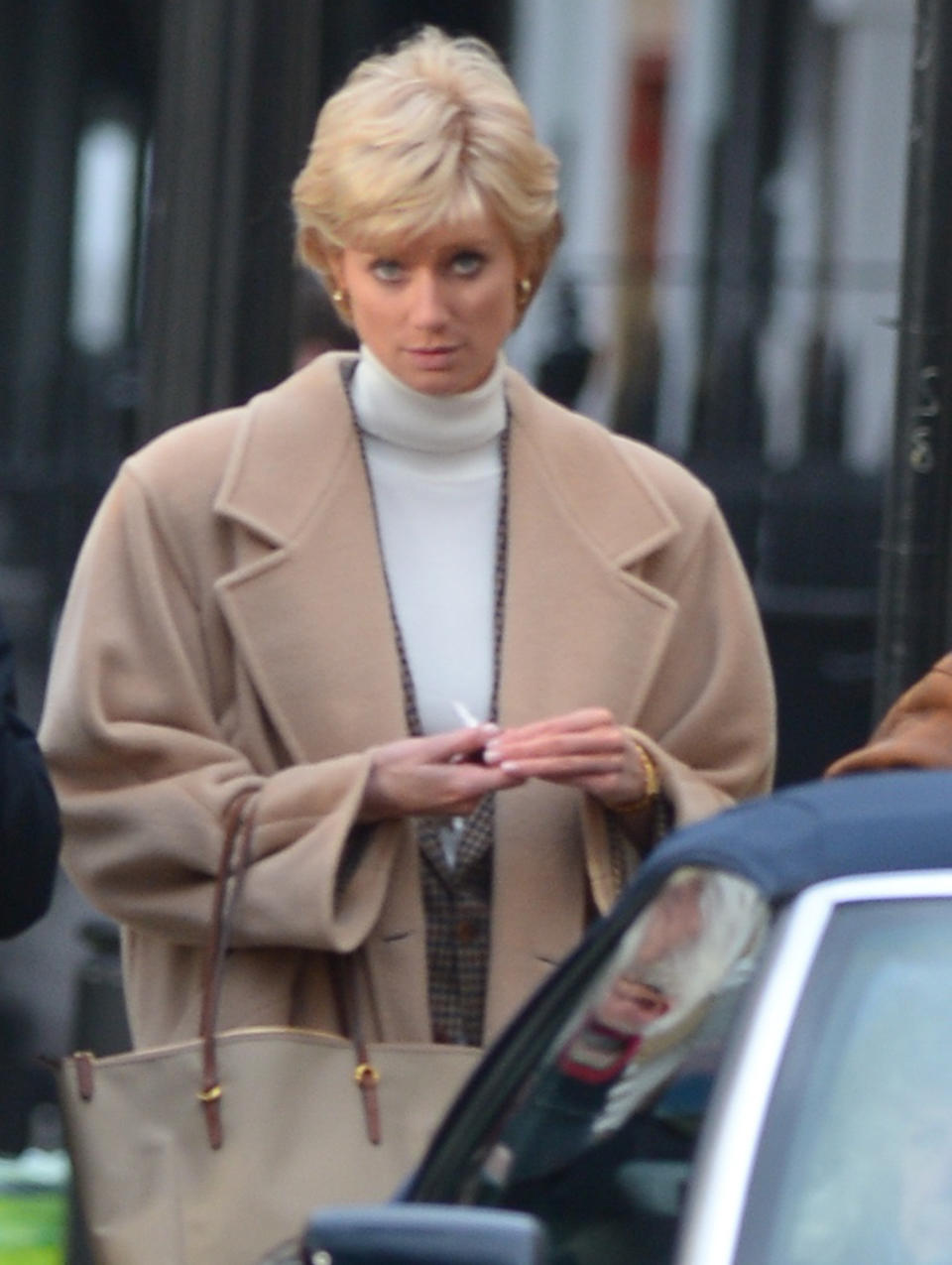 <p>Australian actress Elizabeth Debicki looks exactly like Princess Diana as she prepares to film for <em>The Crown</em> in London on Jan. 20.</p>