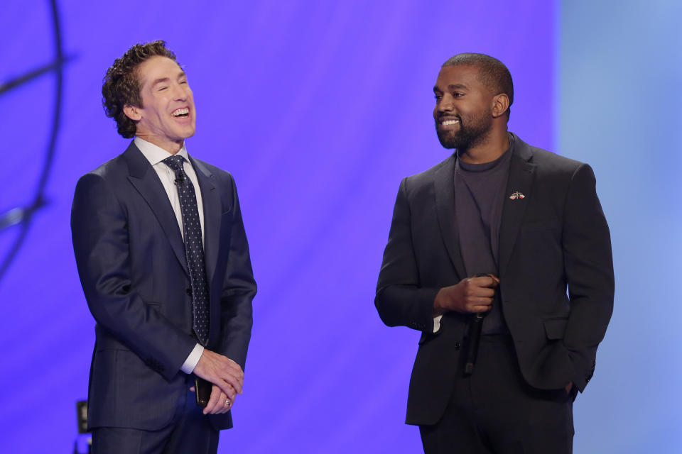 Kanye West, right, answers questions from senior pastor Joel Osteen, left, during a service at Lakewood Church, Sunday, Nov. 17, 2019, in Houston.&nbsp; (Photo: Michael Wyke / ASSOCIATED PRESS)