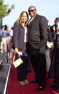 Michael Clarke Duncan and gal at the Universal city premiere of Universal's The Mummy Returns