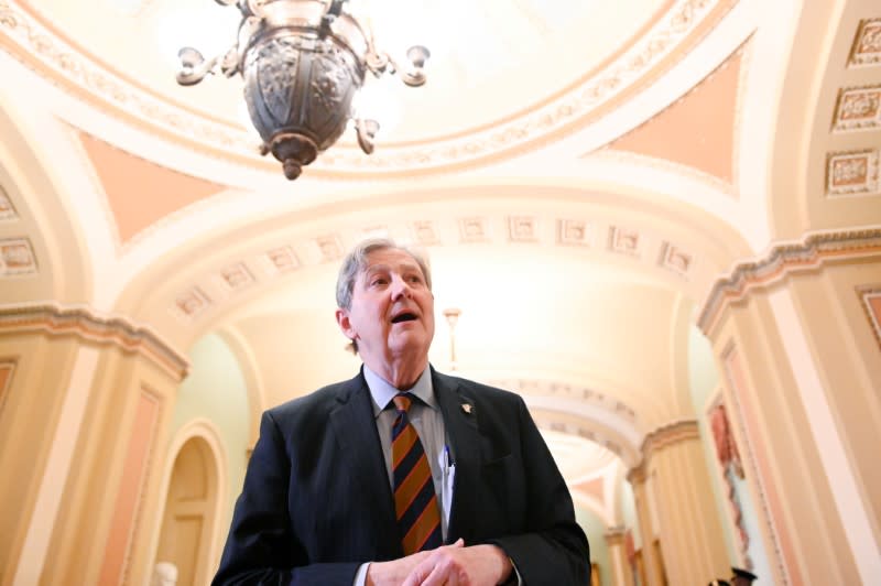 Sen. Kennedy speaks to reporters during a break in the impeachment trial of President Trump