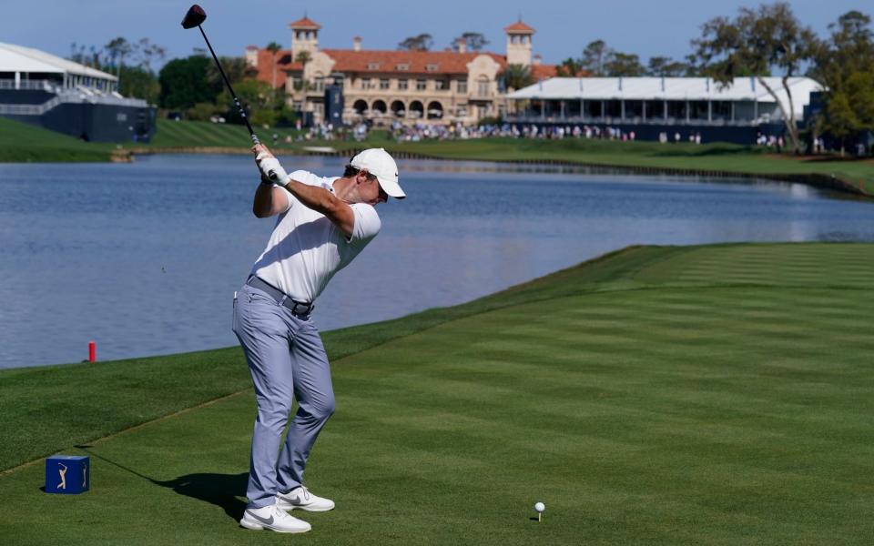 Rory McIlroy tees off the 18th at TPC Sawgrass - AP/Charlie Neibergall