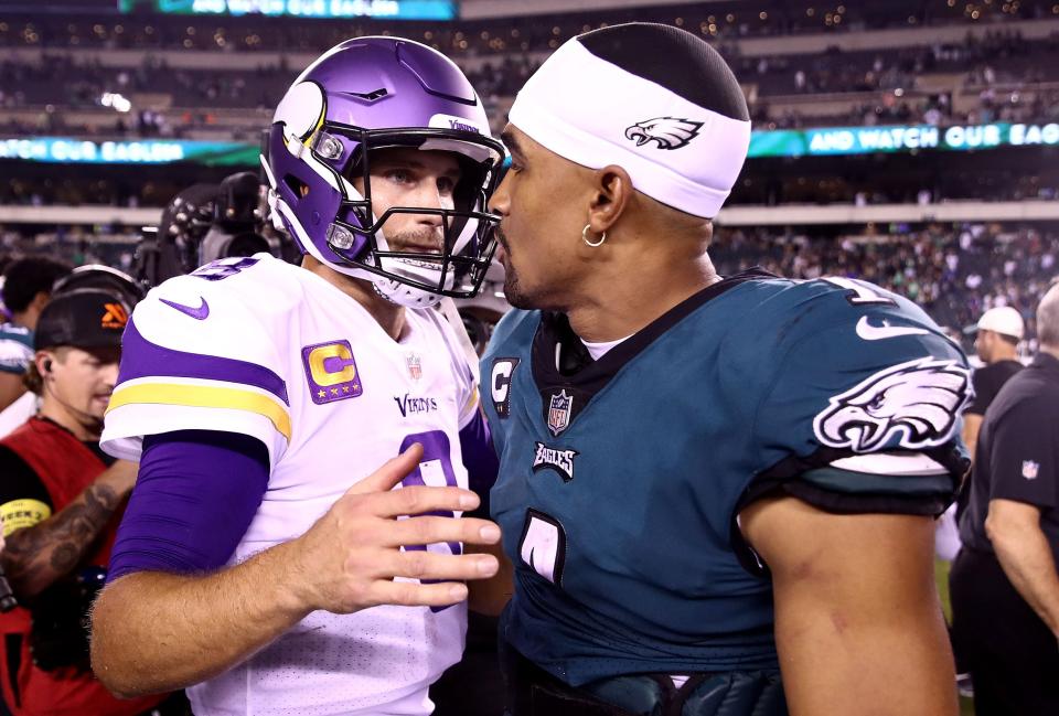 PHILADELPHIA, PENNSYLVANIA - SEPTEMBER 19: Kirk Cousins #8 of the Minnesota Vikings and Jalen Hurts #1 of the Philadelphia Eagles greet one another after their game at Lincoln Financial Field on September 19, 2022 in Philadelphia, Pennsylvania. (Photo by Tim Nwachukwu/Getty Images)