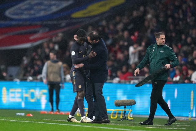 Gareth Southgate embraces Kobbie Mainoo