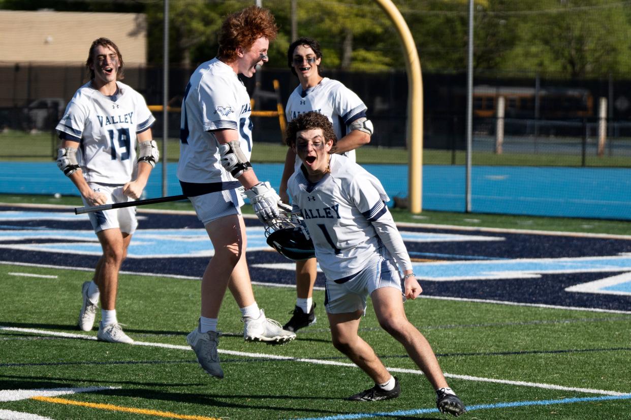 West Milford at Wayne Valley in the Passaic County boys lacrosse final on Saturday, May 6, 2023. Wayne Valley celebrates defeating West Milford.