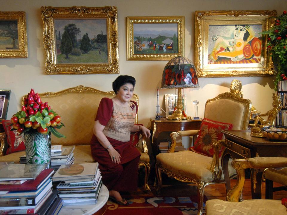 Former first lady Imelda Marcos is seen in her apartment in Manila, 27 June 2007, with a gallery of paintings including a Picasso, seen at upper right. Imelda Marcos says she has nothing to be ashamed of, 08 October 2007.