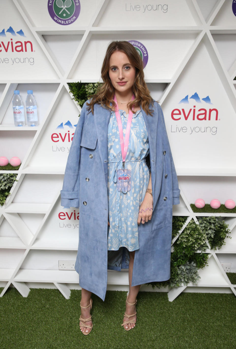 <p>The ‘Made In Chelsea’ star looked every inch the fashionista in a printed summer dress and an oversized coat draped over her shoulders. <i>[Photo: Rex]</i></p>
