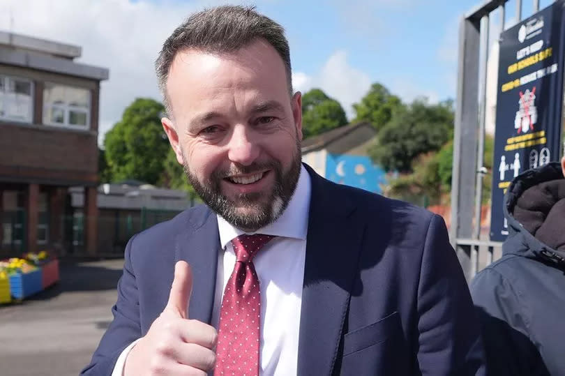 SDLP leader Colum Eastwood arrives to cast his vote in the 2024 General Election at the Model Primary School in Derry