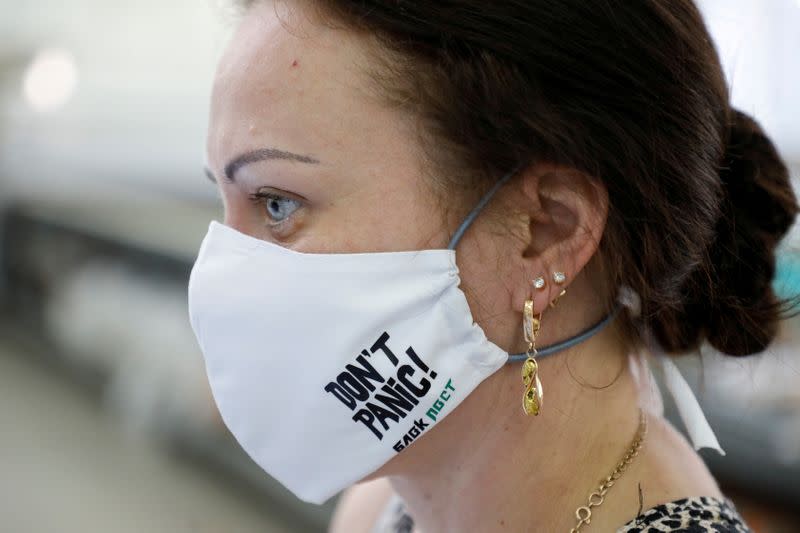 FILE PHOTO: An employee sews protective masks in Stavropol region